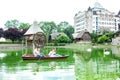 Fortunate family boating on a small lake Royalty Free Stock Photo