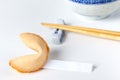 Fortune Cookie With Blank Slip and Bowl and Chopsticks Royalty Free Stock Photo