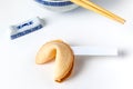 Fortune Cookie With Blank Slip and Bowl and Chopsticks Royalty Free Stock Photo