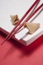 Fortune Cookie and Chopsticks on White Board Royalty Free Stock Photo
