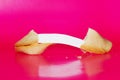 Fortune cookie with message inside Royalty Free Stock Photo