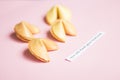 fortune cookie on pink and blue background, pastel colors, prediction of true love Royalty Free Stock Photo