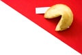 Fortune cookie on white and red background Royalty Free Stock Photo