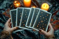 Fortune revealed Tarot reader sets the stage with cards and candlelight