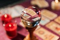 Fortune teller crystal ball on tarot table