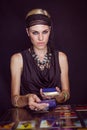 Fortune teller forecasting the future with tarot cards Royalty Free Stock Photo