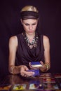 Fortune teller forecasting the future with tarot cards Royalty Free Stock Photo