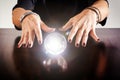 Fortune teller or soothsayer with a crystal ball Royalty Free Stock Photo