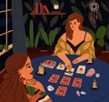 Fortune teller telling predicting future with tarot cards deck. Fortuneteller, taro reader and woman client during