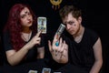 Fortune teller using tarot cards on black background Royalty Free Stock Photo