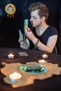 Fortune teller using tarot cards on black background Royalty Free Stock Photo
