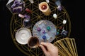 Fortune Telling Table with tarot cards and esoteric objects. Fortune-teller guessing from coffee grounds Royalty Free Stock Photo