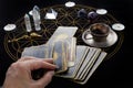 Fortune Telling Table with tarot cards and esoteric objects. Fortune-teller guessing from tarot Royalty Free Stock Photo