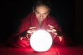 Fortuneteller Holding Hands Around A Glowing Ball