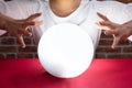 Fortuneteller`s Hand Covering The Crystal Ball Royalty Free Stock Photo