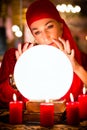 Fortuneteller at Seance or session with Crystal ball Royalty Free Stock Photo