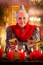 Fortuneteller during Session with tarot cards Royalty Free Stock Photo