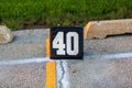 A forty yard line marker ready for a marching band rehearsal in the practice area Royalty Free Stock Photo