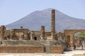 Forum of city destroyed by the eruption of the volcano Vesuvius, view of the Temple of Jupiter and the mountain Vesuvius, Pompeii