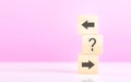 Forward and backward arrows on wooden blocks, symbolizing the concept of thought development. Reflects the process of reflecting