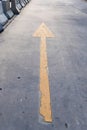 The Forwarded yellow arrow on the road Royalty Free Stock Photo