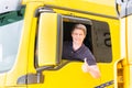 Forwarder or truck driver in drivers cap Royalty Free Stock Photo