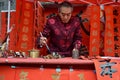 FOSHAN, CHINA - CIRCA JANUARY 2020: A man writing blessing antithetical couples during the Spring Festival. Royalty Free Stock Photo