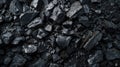 Fossil coal texture background, top view of abstract heap of black stones. Concept of mine, industry, charcoal, nature, energy,