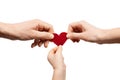 Foster family. Hands of mom, dad and child hold a heart on a white background. Adoption of children, concept