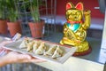 Chef presenting dumplings served at a foodtruck festival Royalty Free Stock Photo