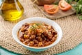 Foul served in dish isolated on wooden table side view of middle eastern food