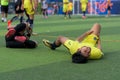 Foul of two players during football tournament.