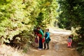 We found a mushroom! Mother with four kids resting in mountains. Family travel and hiking with childrens Royalty Free Stock Photo