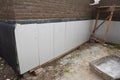 Foundation and basement thermal polystyrene insulation: Rigid eps foam boards are installed before applying waterproofing