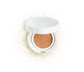 Foundation cushion powder with puff. Cosmetic face powder in the golden glitter circle isolated on white background Royalty Free Stock Photo