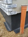 Foundation drainage preparation in construction site Royalty Free Stock Photo