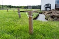 Foundation footings poured in a ditch in the yard, building a terrace in the backyard. Royalty Free Stock Photo
