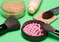 Foundation, powder, blush with makeup brushes Royalty Free Stock Photo