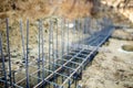 Foundation site of new building, details and reinforcements with steel bars and wire rod Royalty Free Stock Photo