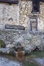 Fountain and bank over old house in Candelario salamanca