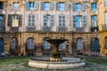 Fountain with Beautiful Old House in the Back at Place D`Albertas in Aix-en-Provence Royalty Free Stock Photo