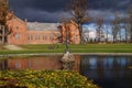 Red palace building in Plunge town park, Lithuania Royalty Free Stock Photo