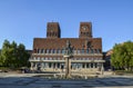 Fountain and bronze statue with women and children in the front of Oslo City Hall (Radhus)