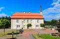 Fountain and building of the former barn. Catholic church. Liskiava. Lithuania