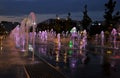 Fountain cascade with evening illumination in Khodynskoye field - Moscow park in southern part of historic area of same name, Mos