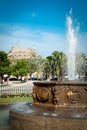 Fountain in center of Corfu city (Kerkyra) with castle in backgr