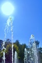 Fountain cheerful jets touch the sun Royalty Free Stock Photo