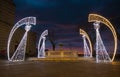 Fountain with christmas lights angel in front of Basilica of Saint Clare in Assisi Royalty Free Stock Photo