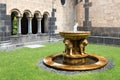 Fountain at courtyard medieval benedictine Abbey in Maria Laach, Germany