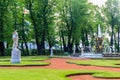 Fountain Crown and marble statues in old city park \